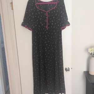 Elegant Black Dress with Pink Accents